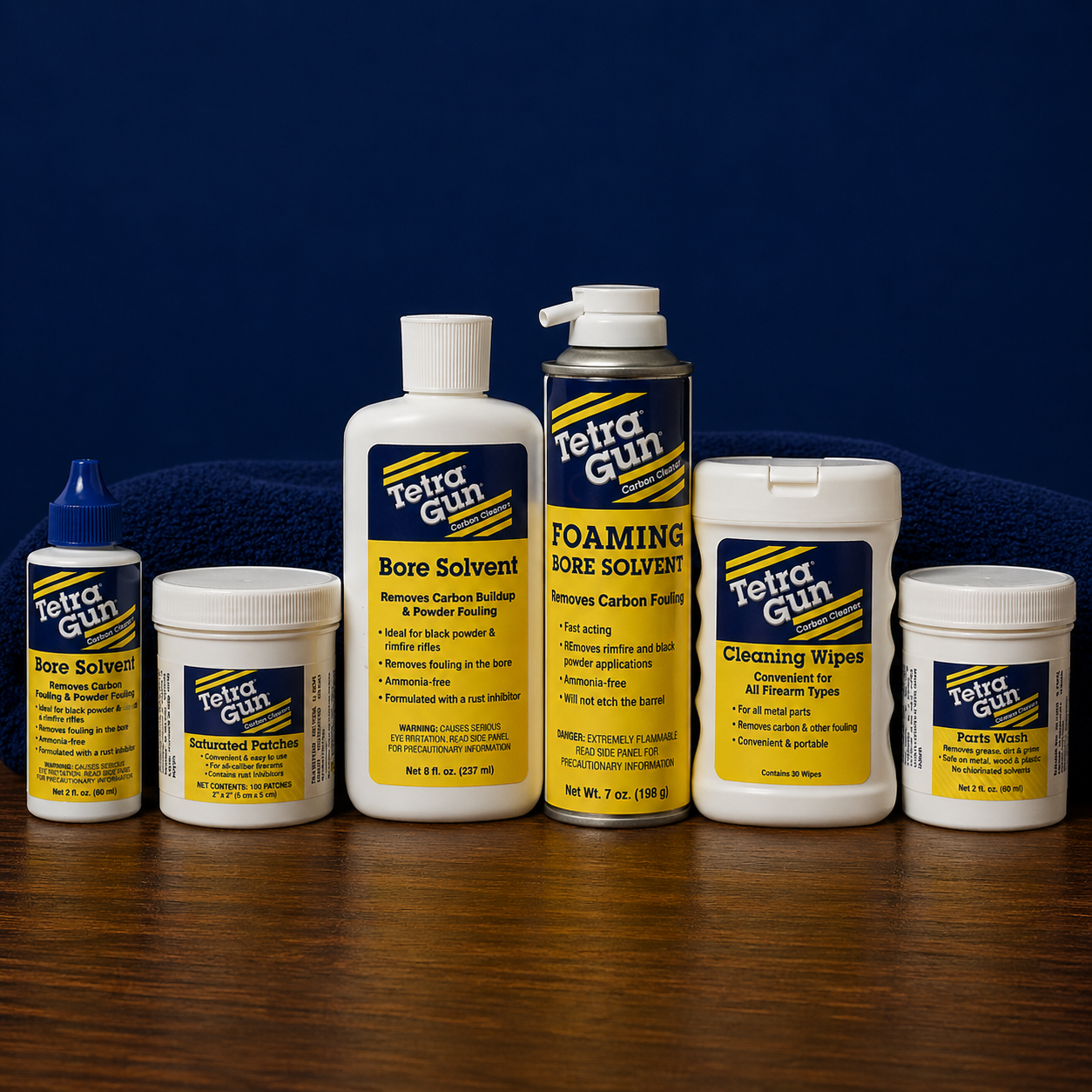 Tetra Gun Cleaning Products Blue Background on a table